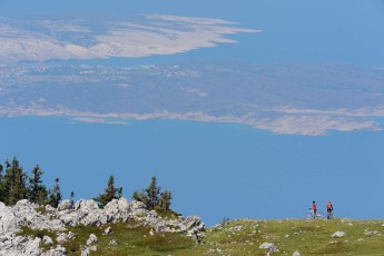 Mountain bikers in a long distance race with goal in Velebit, North Velebit National Park